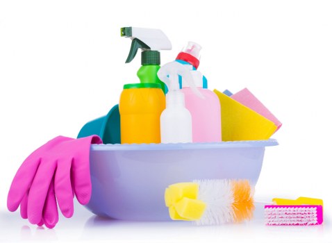 Professional move out cleaning in a kitchen with polished appliances